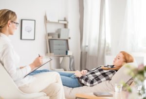 Patient lying in psychologist office